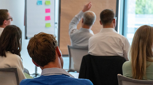 Teilnehmende an einer Präsenz-Veranstaltung